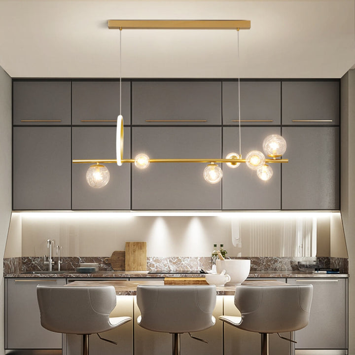 Elegant CHROMA ceiling and bench top light fixture installed above a dining table – modern lighting enhancing dining ambiance