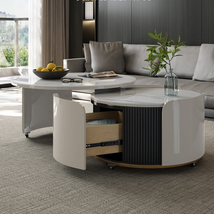 Close-up view of A3005 round retractable coffee table with open drawer, highlighting hidden storage and modern space-saving design
