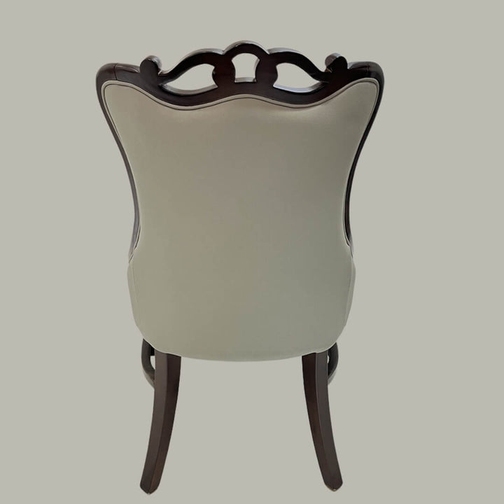 Back side view of American solid wood restaurant dining chair – showcasing sturdy frame, natural wood grain, and ergonomic backrest design