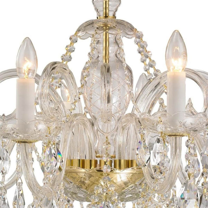 Detailed close-up of Boho 8-arm elegant dining chandelier hanging fixture, highlighting rustic metal arms, intricate craftsmanship, and warm light bulbs