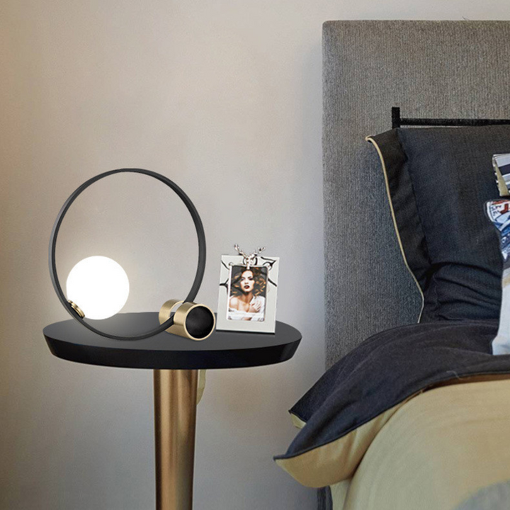 Bozza circle-shaped bedside table lamp, sleek modern design for cozy and stylish bedroom lighting