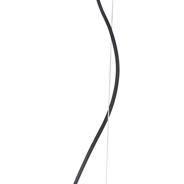 Single light pendant with copper cord hanging fixture, showcasing stylish industrial design in a modern interior