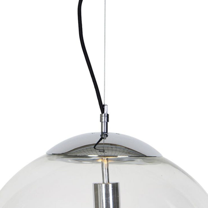 Close-up of single light pendant showing cord join detail with copper accents, highlighting craftsmanship and design