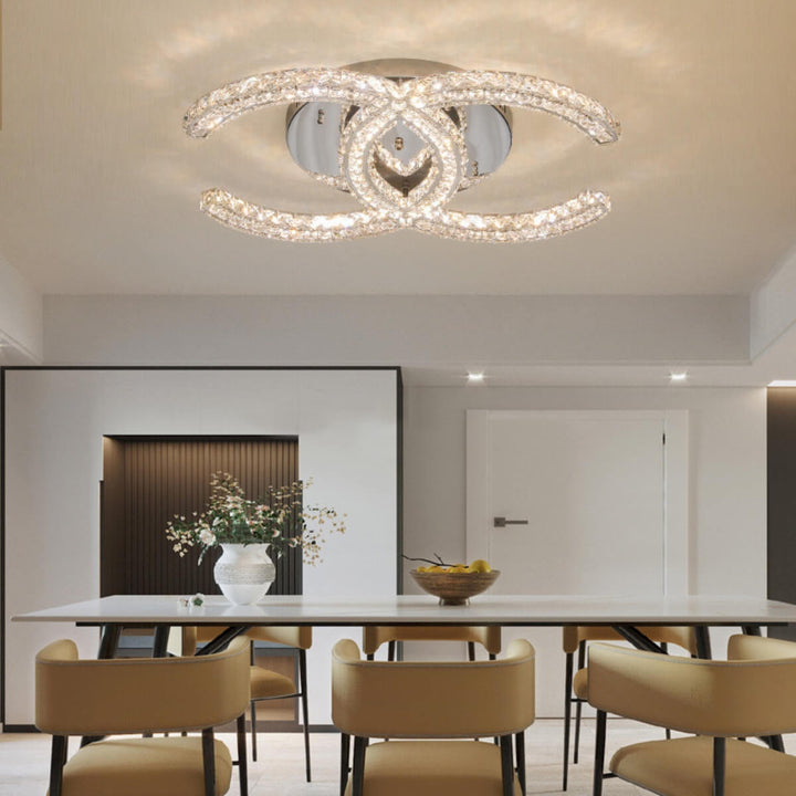 Chantale flush mount ceiling light above dining table in an elegant interior