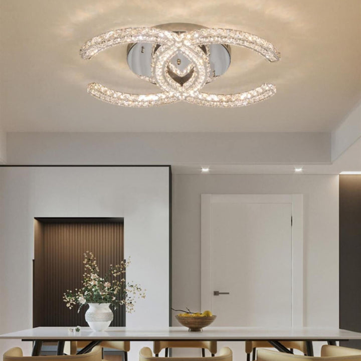  Chantale flush mount ceiling light on, illuminating dining table in a stylish interior