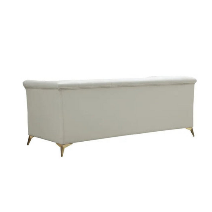 Back side view of Chesterfield tufted sofa showing classic deep button tufting