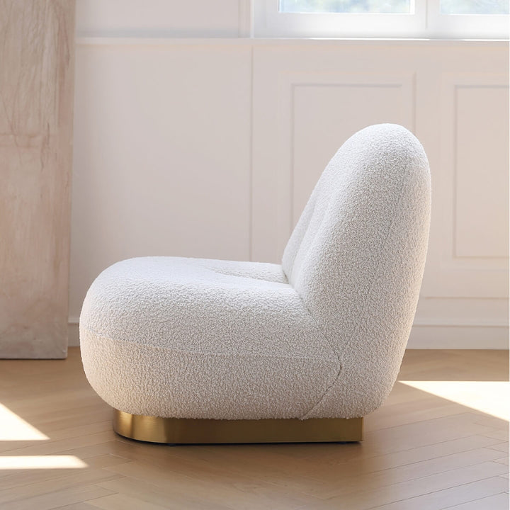 Cloud swivel lounge chair side view with elegant design and plush cushioned seating