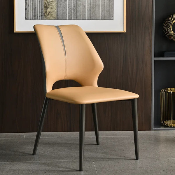 Side angle view of Cora Dining Chair Y70 in an elegant Australian interior – sleek modern design with plush upholstery and curved backrest