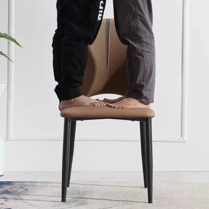  Cora Dining Chair Y70 in a stylish Australian dining space – elegant curves, plush upholstery, and contemporary design for refined interiors