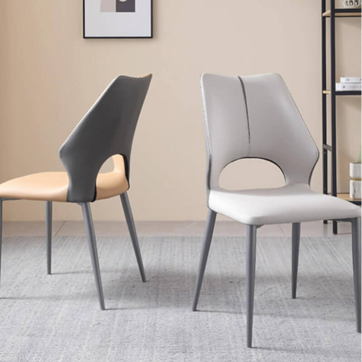 Cora Dining Chair Y70 styled in an elegant Australian dining room – modern silhouette with soft upholstery, perfectly blending into a refined interior setting