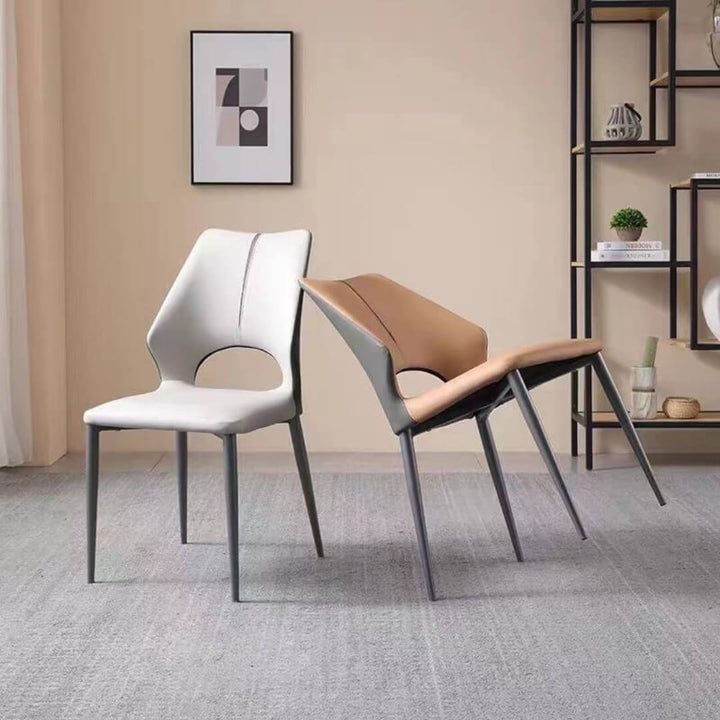 Cora Dining Chair Y70 styled in an elegant Australian dining room – modern silhouette with soft upholstery, perfectly blending into a refined interior setting