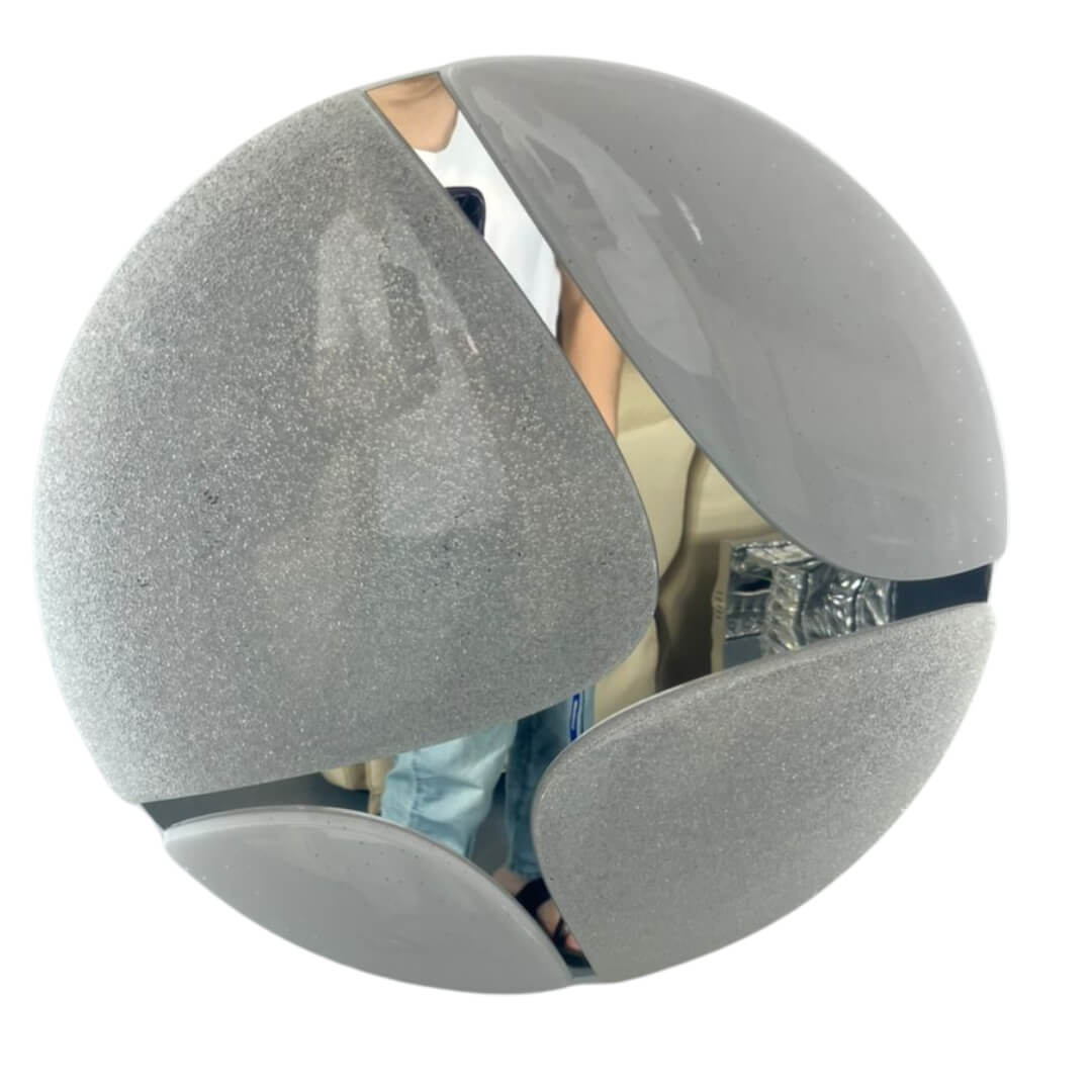 Cosmic Glow ceiling and wall light with modern design, emitting soft radiant illumination for stylish interiors