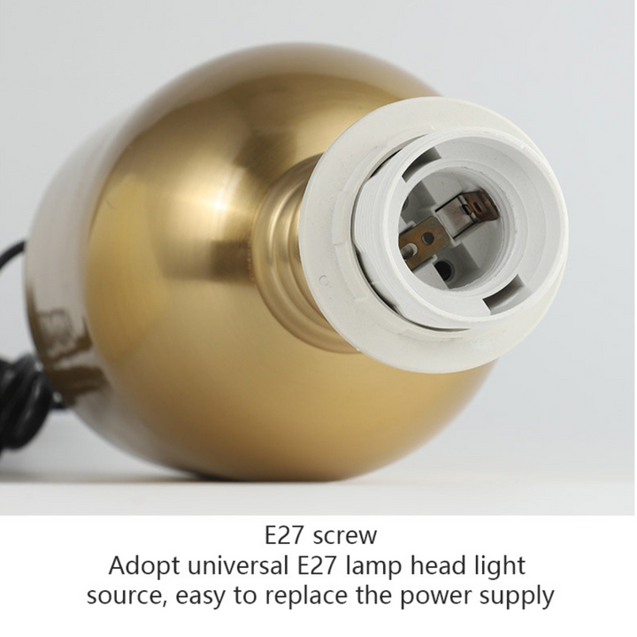 Metal bedside lamp featuring E27 lamp holder for easy bulb replacement