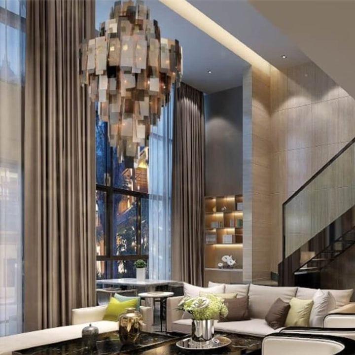 Dusk bronze chandelier by Elegant Interior installed in living room – customized lighting fixture adding warm, elegant ambiance.