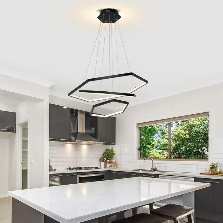 Luster 3-tier LED pendant light elegantly installed above a dining table, providing ambient lighting in a modern dining room