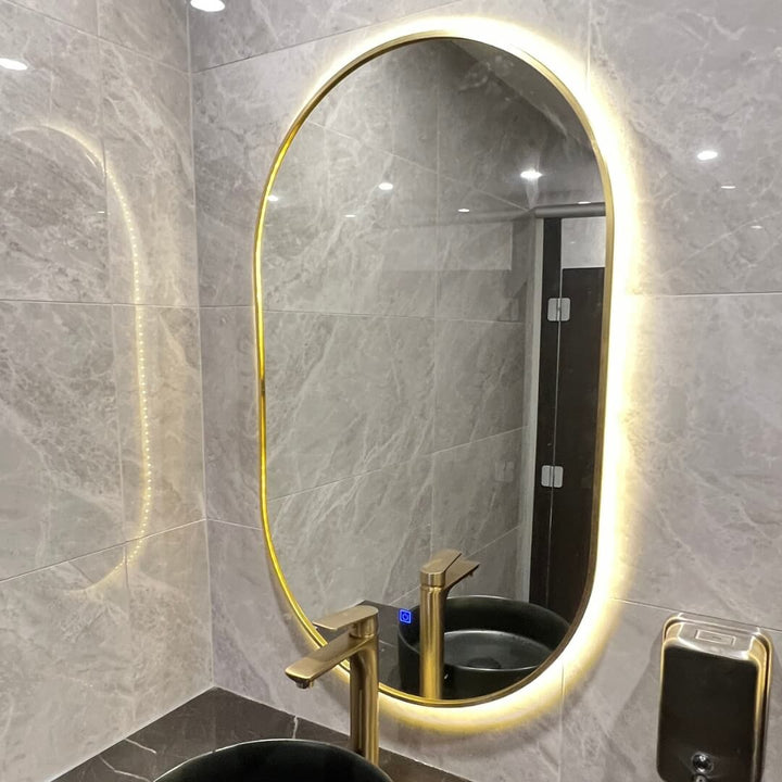 Side view of EO-5083 60cm oval LED mirror by Eclipse Home, sleek modern bathroom mirror design