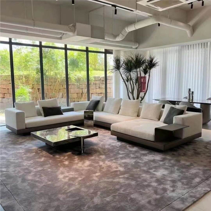 Front view of Eastor sofa in elegant interior – modern plush seating with sleek design and soft upholstery