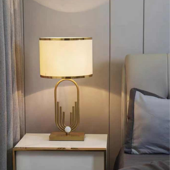 Elegant copper bedside lamp from Eternal collection enhancing bedroom ambiance