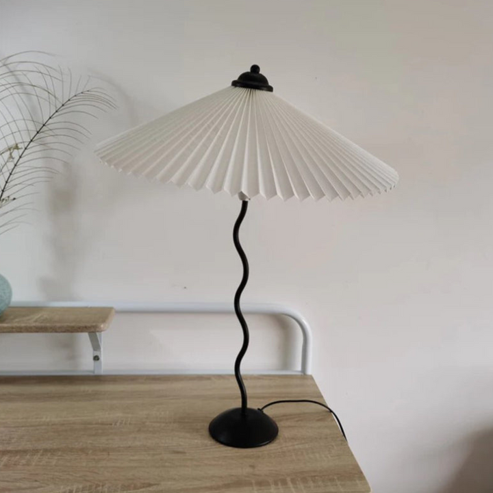 Stylish folded shade table lamp perfect for contemporary home decor