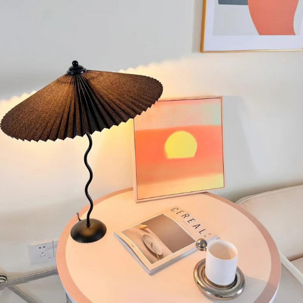 Modern table lamp with unique folded shade design