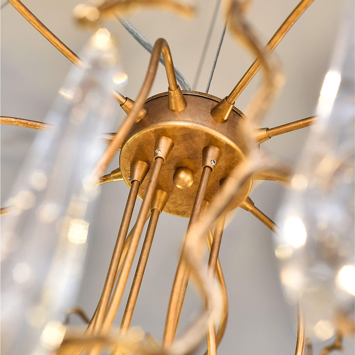 Close-Up Detail of Metal Connector on Glimmer Chandelier Light – Elegant Modern Lighting Fixture
