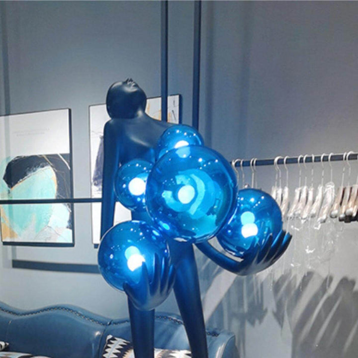 HTA-002 humanoid floor lamp with blue lampshade and blue light on, in elegant Australian interior