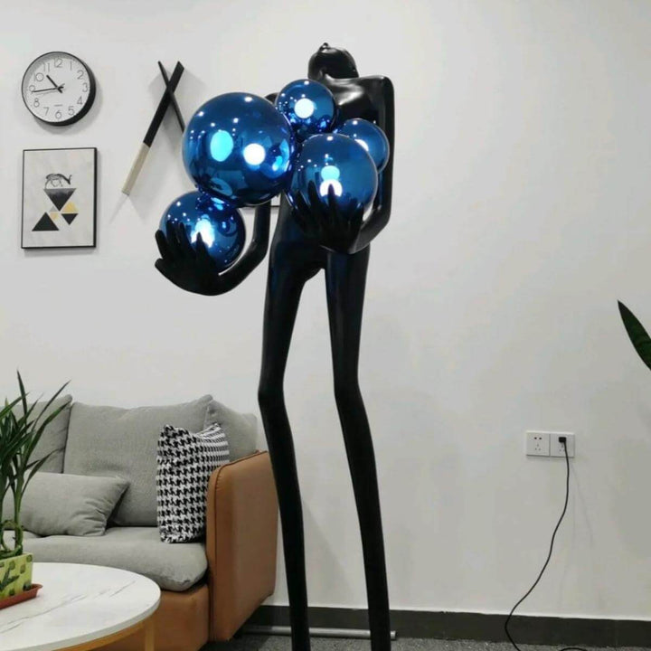 Front view of HTA-002 humanoid floor lamp with blue lampshade in elegant Australian interior design