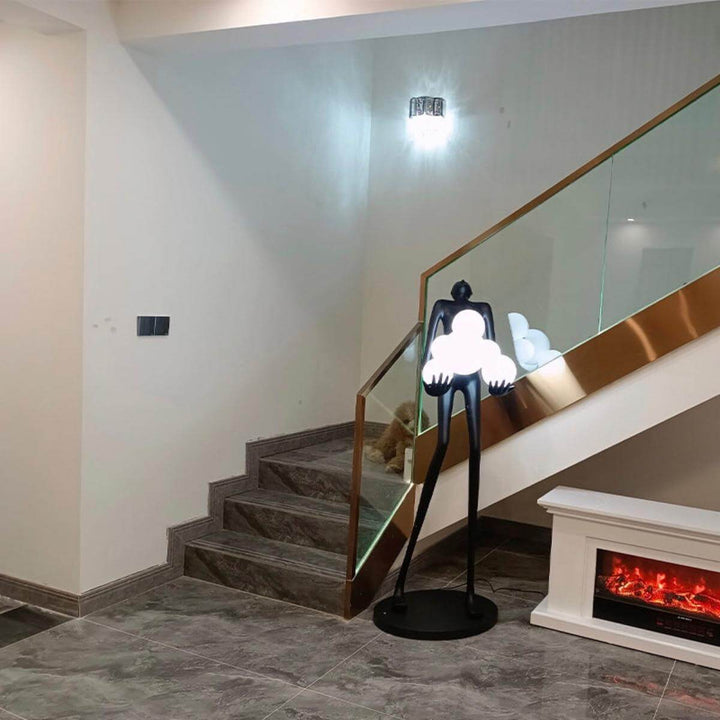 Front view of HTA-002 humanoid lamp with blue lampshade beside stair in elegant Australian interior