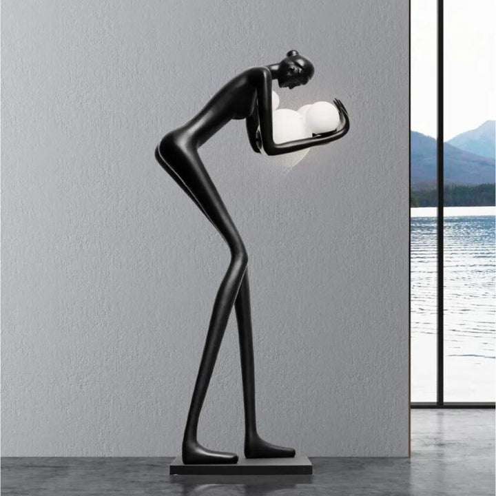 HTA-005 humanoid man and woman floor lamp sculpture displayed in modern Australian interior design