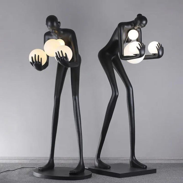 HTA-005 humanoid man and woman floor lamp sculpture in Australian interior, blending art and lighting