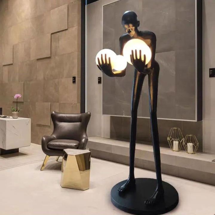 Front angle view of HTA-005 humanoid man and woman floor lamp in Australian interior with artistic design