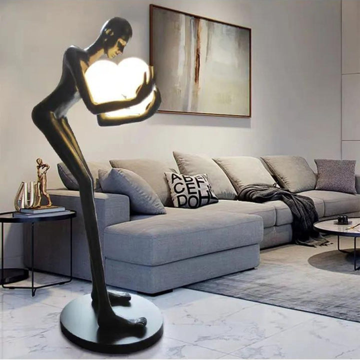 HTA-005 humanoid man and woman floor lamp turned on in living room, blending art and warm lighting