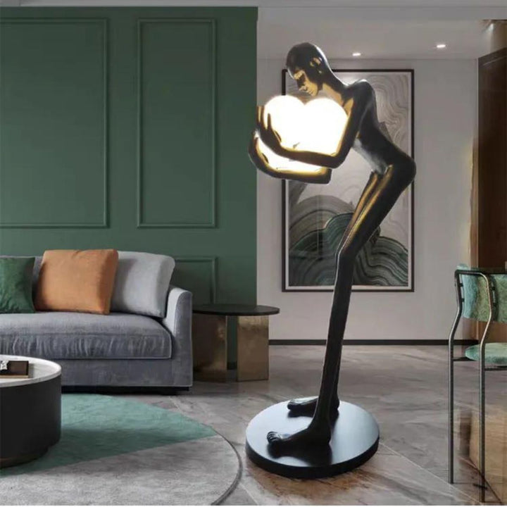 Side view of HTA-005 humanoid man and woman floor lamp sculpture in modern Australian interior