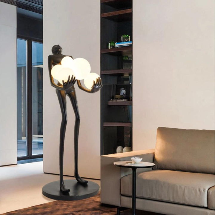 HTA001 humanoid floor lamp turned on, shown from an angled view highlighting modern design