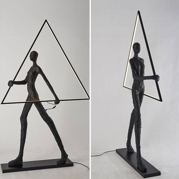 Side and front views of human statue floor lamp featuring a geometric triangle design, showcasing artistic sculpture and modern ambient lighting