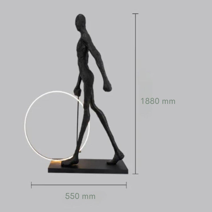 Man walking beside a circle LED floor lamp, with visible lamp dimensions highlighting its height and sleek circular design