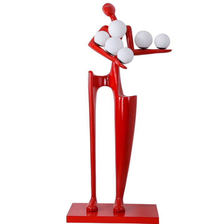 HTA027 red sculpture floor lamp displayed in an Australian interior, featuring a figure holding a light and adding vibrant artistic flair