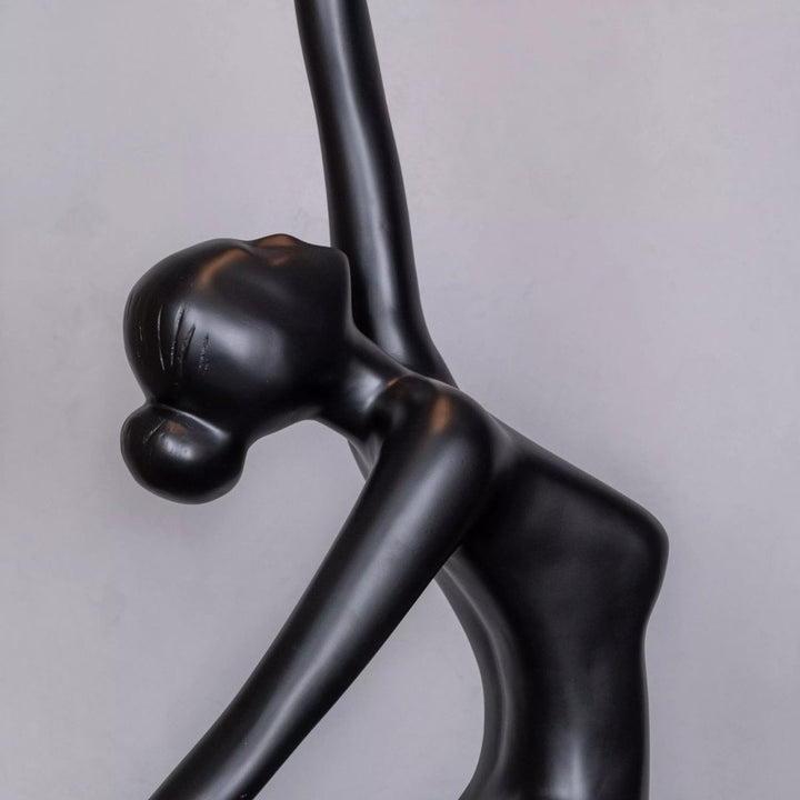 Close-up view of HTA033 Ballerina floor lamp highlighting its graceful form, sculpted lines, and elegant modern finish