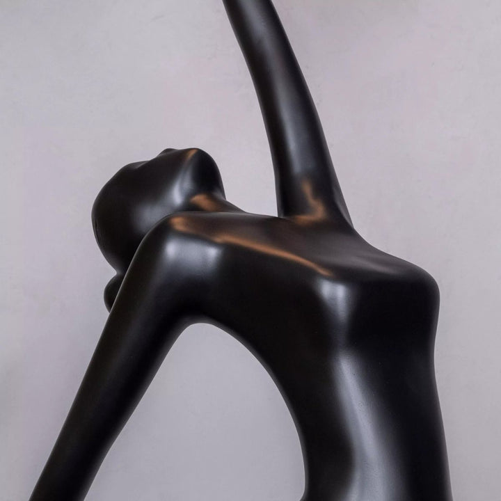 Curved side view of HTA033 Ballerina floor lamp highlighting its elegant flowing lines and smooth sculptural design