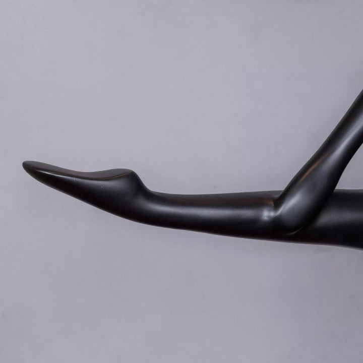 Close-up of HTA033 Ballerina floor lamp leg, highlighting the elegant curvature and refined craftsmanship of the base design