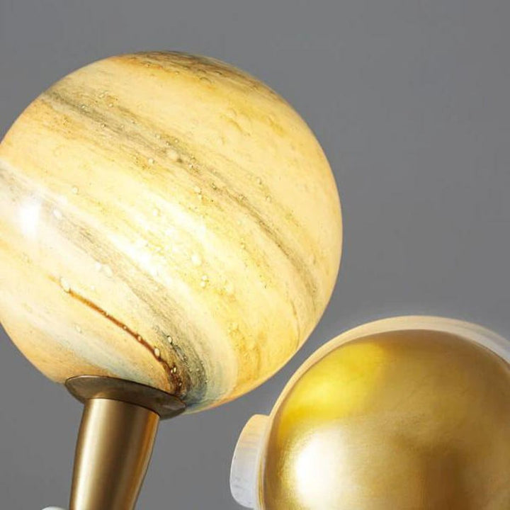 Close-up detail view of HTQ007 sitting astronaut table lamp, highlighting futuristic design elements