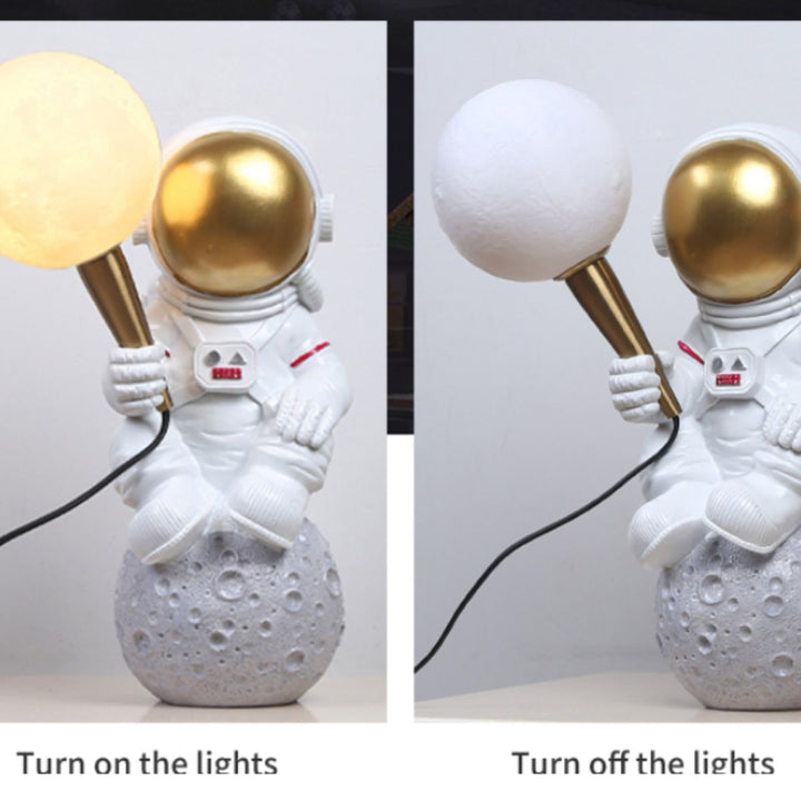 HTQ007 sitting astronaut table lamp showing lights turned on and off, featuring futuristic space design