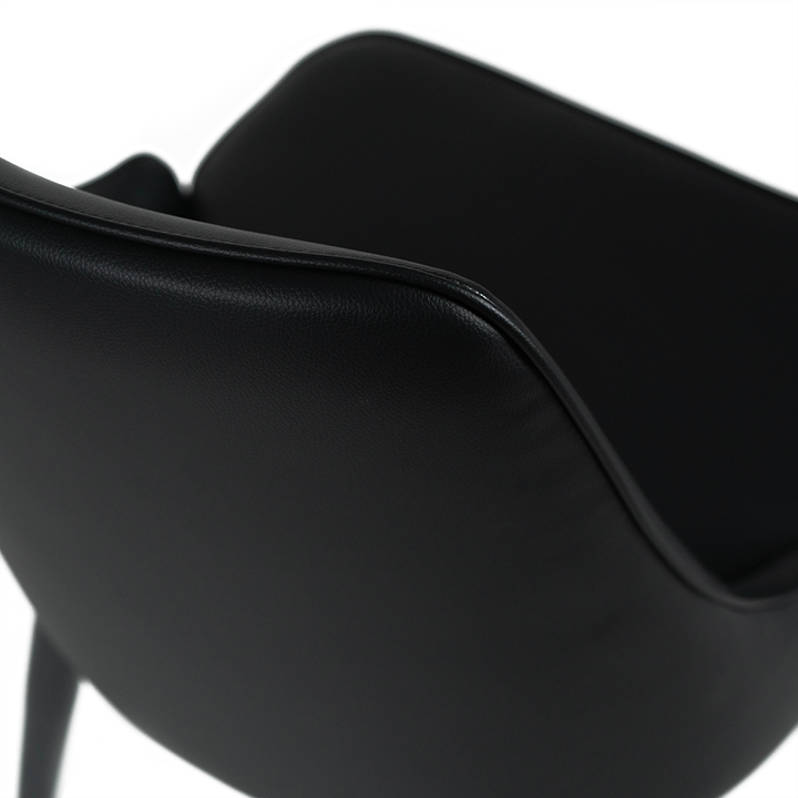 HighHop dining chair upper detail view in elegant interior, showcasing ergonomic design and craftsmanship