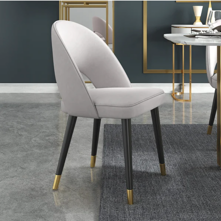Modern Indiana chair upholstered in microfiber with leather accents for dining or lounge