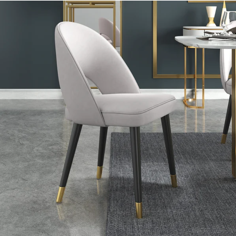 Modern Indiana chair upholstered in microfiber with leather accents for dining or lounge