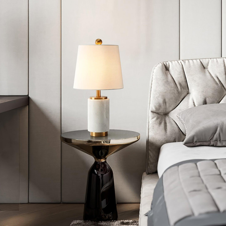 Joana marble-based table lamp placed beside bed in modern bedroom