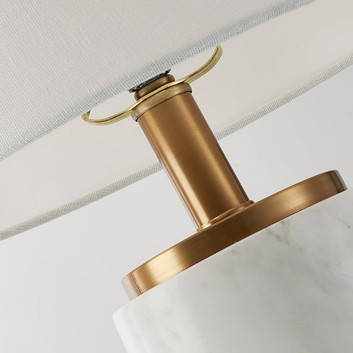 Close-up view of Joana marble-based table lamp light showing warm glow