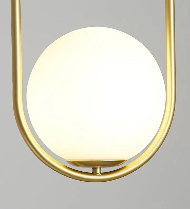 Klay Round Glass Suspended Light Detail – close-up of round clear glass globe showcasing smooth surface and refined modern craftsmanship.