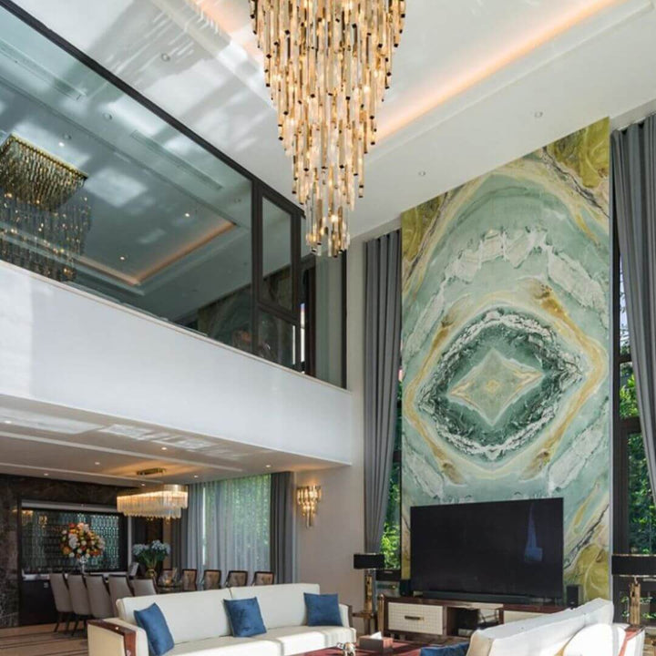 Mirage long crystal chandelier light hanging in living room, adding elegance and ambient illuminatio
