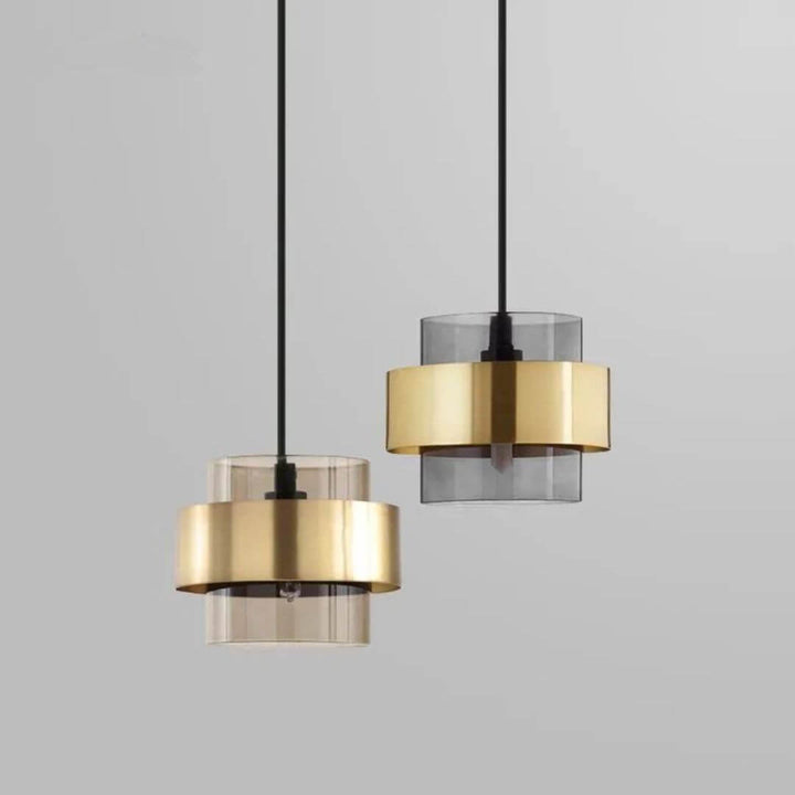 Lumos chandelier light hanging in Australia, featuring a sleek cement body and glass shade, delivering soft, even illumination with a modern industrial aesthetic.